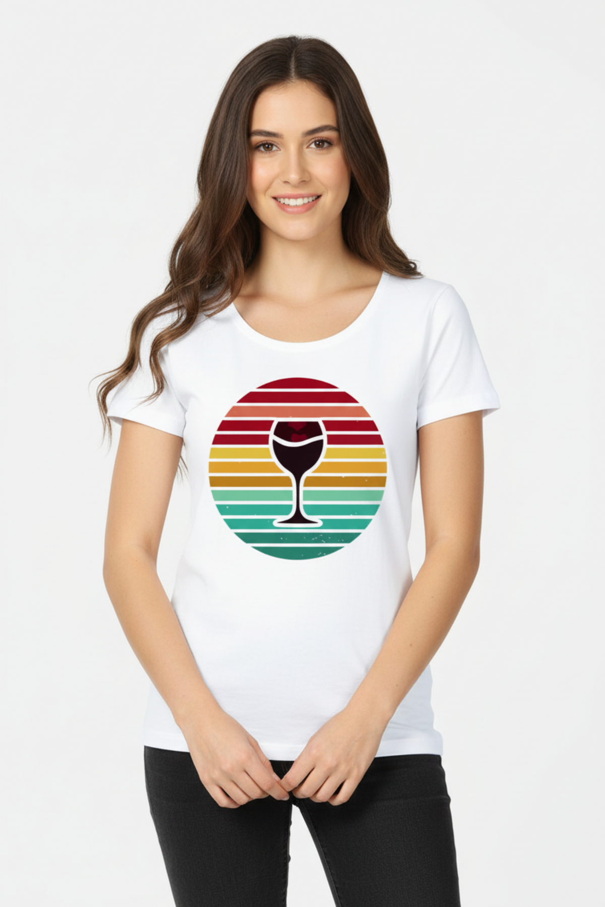 A woman wearing a white short-sleeve crewneck t-shirt with a retro circular graphic of a wine glass silhouette over horizontal sunset stripes in red, orange, yellow, and green.