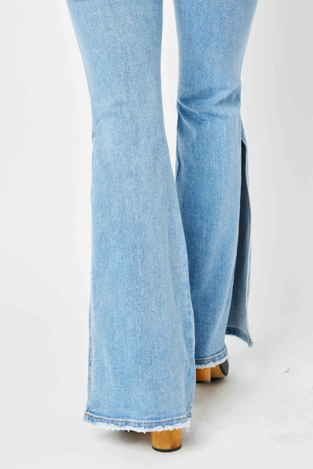 Judy Blue Full Size Mid Rise Raw Hem Slit Flare Jeans - TRENDMELO