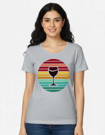 Front view of a grey melange regular fit women's t-shirt featuring a retro circular sunset graphic with crimson, amber, and teal stripes.