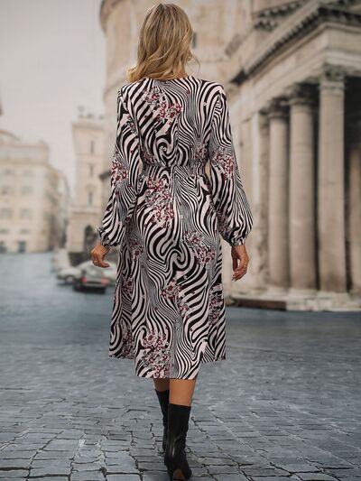 Animal Print Smocked Surplice Long Sleeve Dress - TRENDMELO