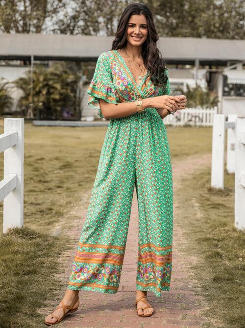 Floral Surplice Flutter Sleeve Jumpsuit - TRENDMELO