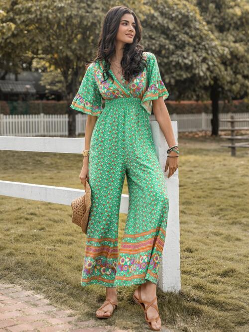 Floral Surplice Flutter Sleeve Jumpsuit - TRENDMELO