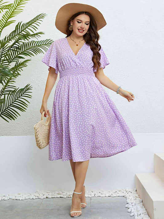 Plus Size Printed Smocked Waist Surplice Dress - TRENDMELO