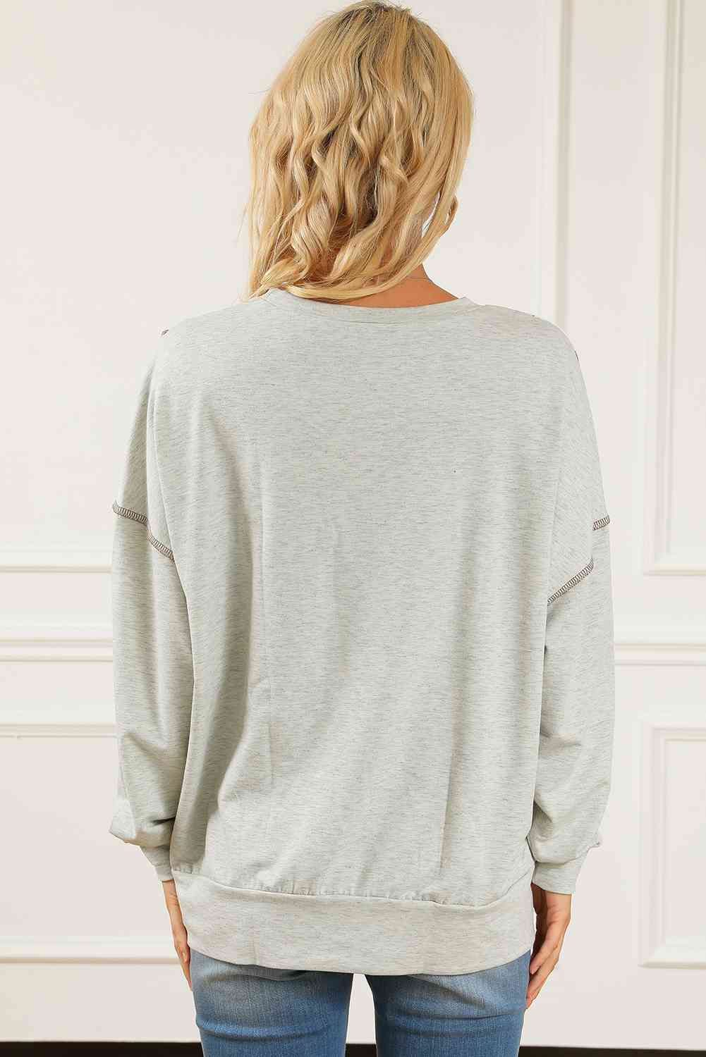 Leopard Exposed Seams Round Neck Sweatshirt - TRENDMELO