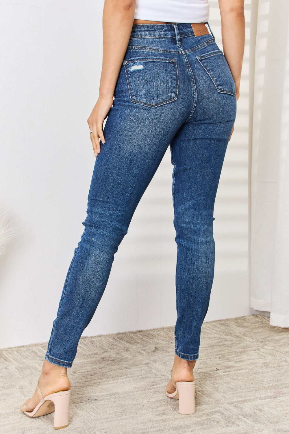 Judy Blue Full Size Mid Waist Distressed Slim Jeans - TRENDMELO